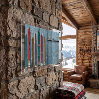 Vintage alpine ski acrylic wall art displayed inside a cozy mountain cabin